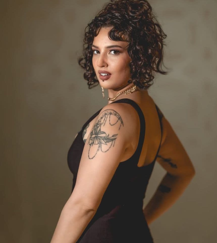 Belle Amelie, Co-owner of Create Now Company, in a warm editorial portrait.